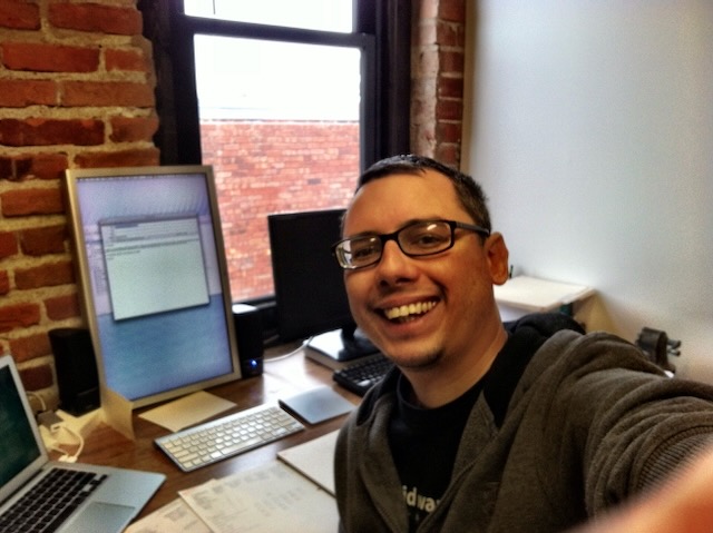 Phil at his desk in the early Philsquare office